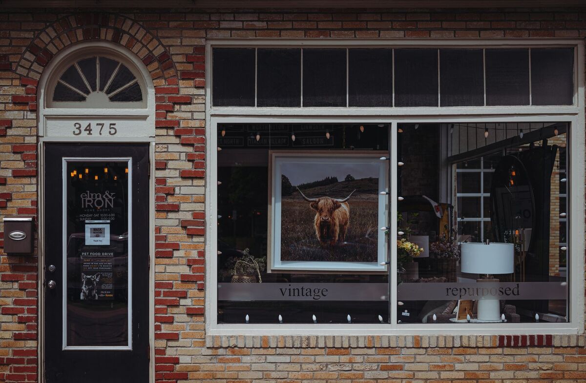 Independent boutique and cafe signage along a Decatur, GA main street