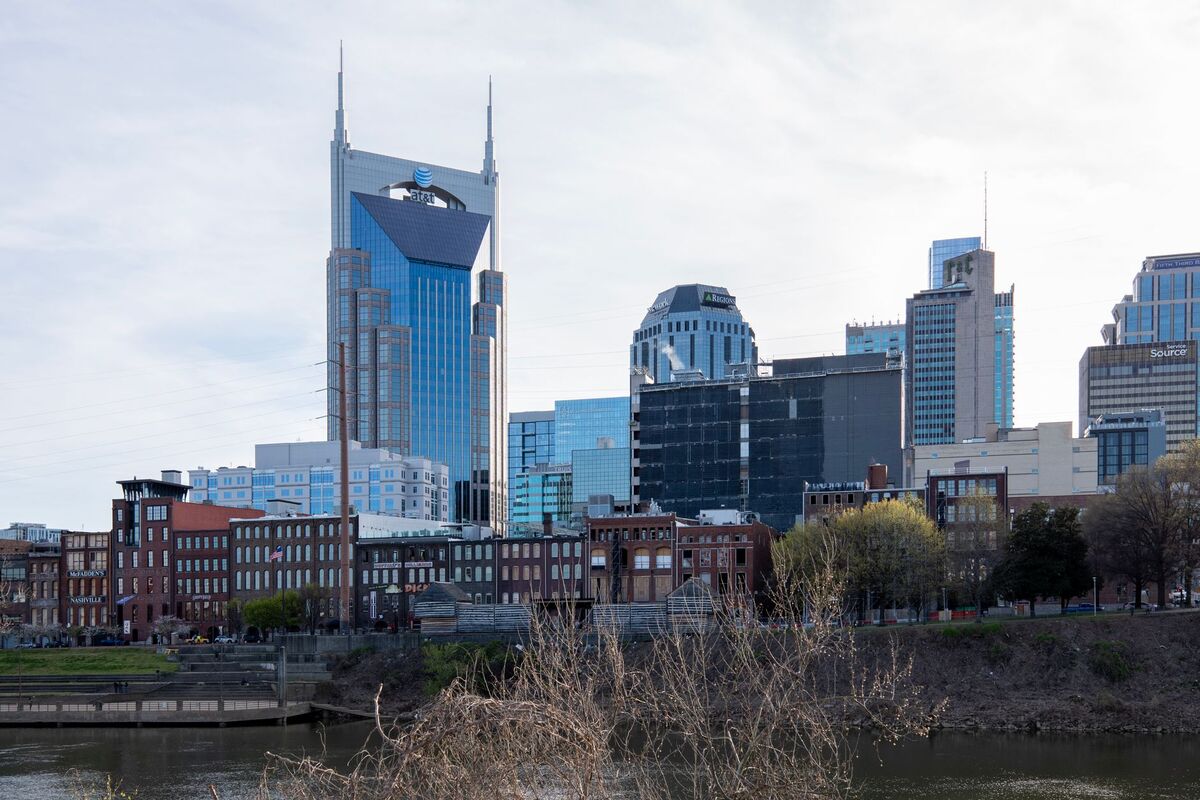 Upscale Alpharetta mixed-use district with shops, restaurants and pedestrians near Avalon